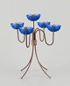 L'Art presents: Gunnar Ander for Ystad Metall, Sweden. Tall candlestick holder in brass and blue art glass ...