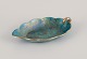 Josef Ekberg (1877-1945) for Gustavsberg, Sweden.
Leaf-shaped ceramic bowl with glaze in green-blue tones, gold decoration.