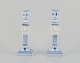 Royal Copenhagen, a pair of Blue Fluted candlesticks.