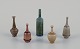 John Andersson for Höganäs, Sweden.
A set of five unique miniature ceramic vases in various shapes and glazes.