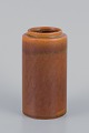 Bengt Berglund for Gustavsberg. Ceramic vase from the "Stampe" series. Ochre 
yellow glaze.
