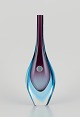 Murano, Italy. Art glass vase with a slender neck. Blue and purple glass.