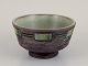 Tilgmans Keramik, Sweden. Ceramic bowl on a pedestal. Handmade.
Glaze in green tones.