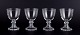 Val St. Lambert, Belgium. A set of six four wine glasses in clear mouth-blown 
crystal glass.