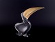 Murano, Italy. Large art glass sculpture of a toucan in clear glass with a 
gold-colored glass beak.