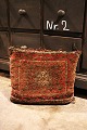 Old decorative 
pillows made 
from antique 
Persian carpets 
...