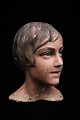 K&Co. presents: 
Decorative, 
old mannequin 
head of a woman 
from the 30s in 
painted plaster 
and papier 
mache...