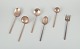 Sigvard 
Bernadotte 
"Scanline" 
brass flatware. 
 
Six ...