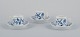 Meissen, Germany. Blue Onion. A set of three small chocolate cups with saucers. 
Hand-decorated with blue flowers.