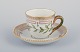 Royal Copenhagen Flora Danica demitasse cup with saucer.