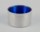 Just Andersen. 
Salt cellar in 
pewter. Insert 
in blue glass.