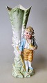Bisquit vase 
with boy, 
Germany. 19th 
century