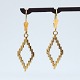 Antik 
Damgaard-
Lauritsen 
presents: 
Hermann 
Siersbøl 
earrings of 14k 
gold