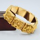 Wide handmade 
bracelet of 14k 
gold, w. 1,9 
cm.