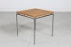 Knud Joos
Side table of oak
with metal legs