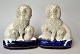Staffordshire 
faience poodle 
figurines, a 
pair, approx. 
...