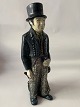 Michael Andersen: Man with dog in Persia glazed pottery.Height 28 cm.SOLD