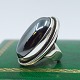 Antik 
Damgaard-
Lauritsen 
presents: 
Regitze 
Overgaard for 
Georg Jensen; 
Big silver ring 
wit hematite 
#46E