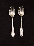 A pair of Empire silver salt spoons