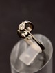 18 carat white 
gold ring with 
5 diamonds