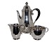 Georg Jensen 
silver
Rare 
coffeepot, 
creamer and 
sugar ...