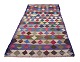 L'Art presents: 
Persian 
Nomad Harsin 
Kilim.
Large 
hand-knotted 
wool rug.