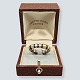 Antik 
Damgaard-
Lauritsen 
presents: 
Anette 
Kræn; A Danish 
design ring in 
silver with 
gold