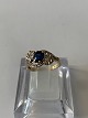 Antik Huset 
presents: 
9 Karat 
Gold Ring with 
Blue Sapphire 
and Diamonds
Size 48 / 
15.58 mm.