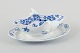 Meissen, Germany. Blue Onion porcelain gravy boat with two handles on a foot.