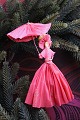 Old Christmas 
tree ornament, 
nice lady with 
umbrella ...