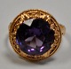 14 karat red 
gold ring with 
brilliant cut 
amethyst, 20th 
...