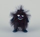 Martinex, Finland. ‘Stinky’ Mummy figure of dark blue plastic covered with black 
hair.