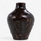 Roxy Klassik 
presents: 
Axel Salto 
/ Royal 
Copenhagen.
A vase in 
partially 
glazed 
chamotte. 
Signed.
1 pc. in ...