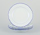Meissen, Germany. A set of four dinner plates.
White porcelain with blue rim.