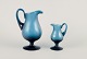 L'Art presents: 
Signe 
Persson-Melin, 
Swedish glass 
artist.
Two jugs made 
of art glass.