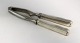 Lundin Antique 
präsentiert: 
Georg 
Jensen. 
Silberbesteck 
(925). 
Dobbeltriflet. 
Nussknacker. 
Länge 17 cm.