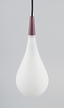 L'Art presents: 
Louis 
Poulsen pendant 
in opal glass 
and precious 
wood.