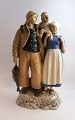 Lundin Antique 
presents: 
Bing & 
Grondahl. 
Porcelain 
figurine.
Fisherman's 
family. Model 
2025. Height 31 
cm. (1 ...