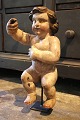 K&Co. presents: 
Decorative, 
antique early 
19th century 
Putti / angel 
in carved wood 
with fine 
original paint 
...