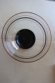 ViKaLi 
presents: 
A 
beautiful bowl 
made of glass
With gold 
stripsr, and 
black and white 
strips and a 
black ...