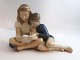 Royal 
Copenhagen. 
Porcelain 
figure. 
Children 
reading. ...