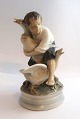 Royal 
Copenhagen. 
Porcelain 
figure. The 
Goose Thief. 
...