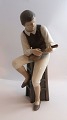 Bing & 
Gröndahl. 
Porcelain 
figure. 
Mandolin 
player. ...