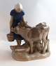 Bing & 
Gröndahl. 
Porcelain 
figurine. Girl 
with calves. 
...