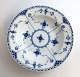 Lundin Antique 
presents: 
Royal 
Copenhagen. 
Blue fluted, 
half lace. Deep 
plate. Model 
566. Diameter 
21.5 cm. (2 ...
