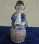 Antikkram 
presents: 
Royal 
Copenhagen 
Denmark, 
figurine No 
3689 Boy with 
horn