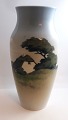 Royal 
Copenhagen. 
Porcelain vase 
with farmhouse. 
Model ...