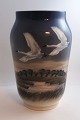Royal 
Copenhagen. 
Porcelain vase 
with swans. 
Model ...