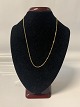 Armor-like 
round necklace, 
in 8 carat 
gold.
Length: 46 cm.