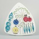 L'Art presents: 
Rörstrand, 
Sweden
Cutting board 
in stoneware 
from the 
Picknick 
series.